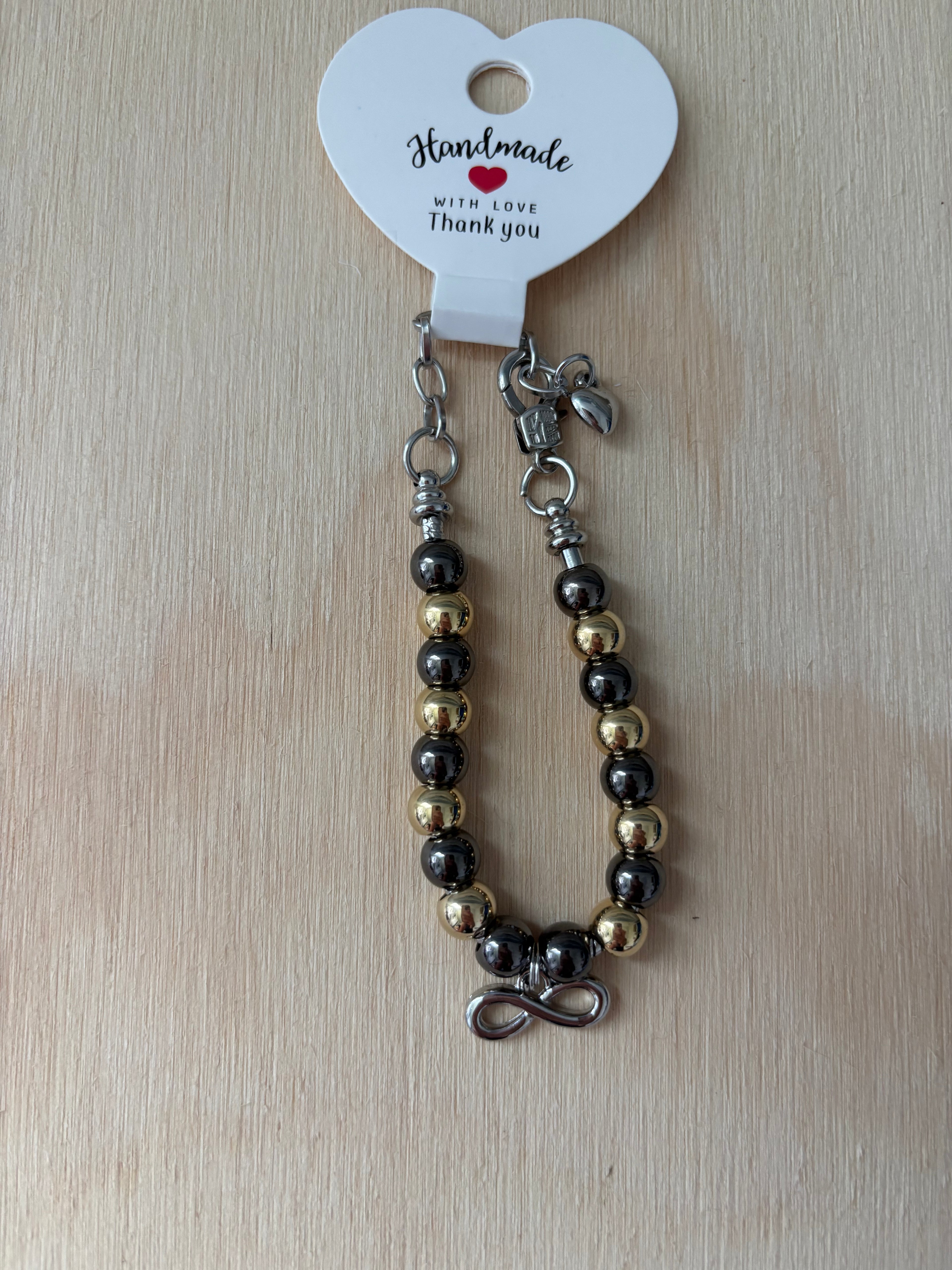 Infinity Bracelet (Black and Gold)